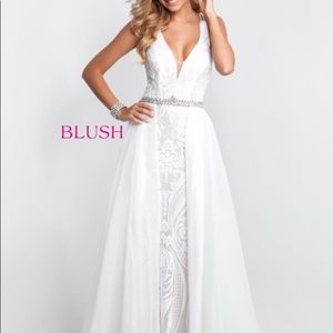 Size 2 white straight gown with mesh train.